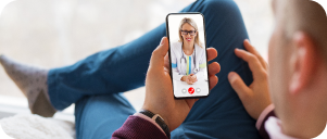 Image of man having a virtual doctor visit through his mobile phone